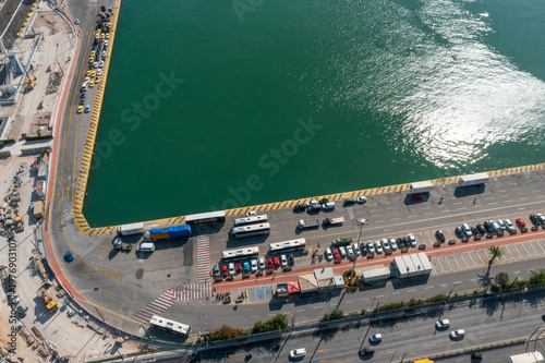 Aerial view of turquoise harbor basin and dock area in Piraeus port, Athens, Greece