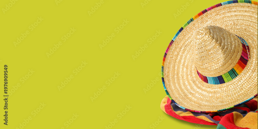 Obraz premium A sombrero rests on colorful fabric for Cinco de Mayo