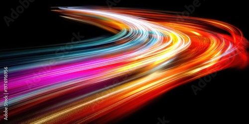 Abstract colorful light trails on a dark background, motion blur effect