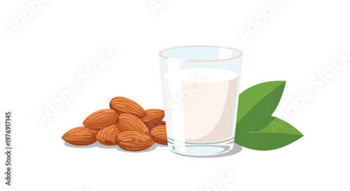 A clear drinking glass containing fresh almond milk stands beside a rustic pile of raw brown nuts and two bright green leaves in a clean white space.