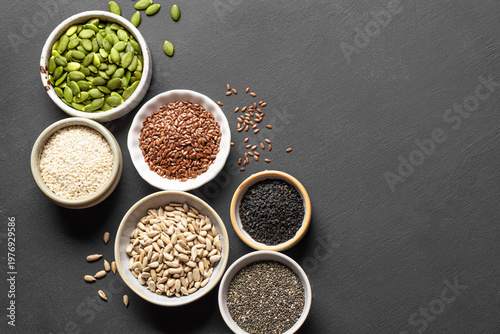 Obraz na plátně Assortment of seeds in bowls for healthy eating