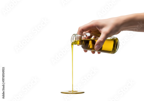 healthy hand pouring golden extra virgin olive oil from a clear bottle against a transparent studio background with copy space, commercial food quality concept