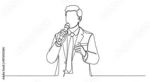 A man in a suit holding a microphone.