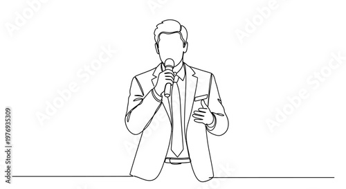 A man in a suit holding a microphone.