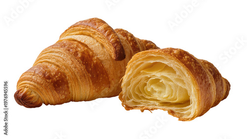 Golden flaky croissants with creamy filling, one partially opened