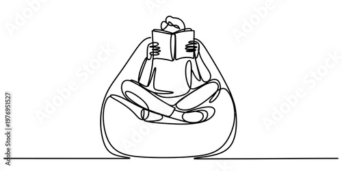 A continuous line drawing of a person sitting in a bean bag chair and reading an open book now.