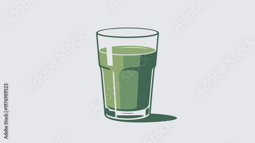 A glass of green juice on a plain background for a healthy lifestyle