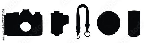 Classic photography equipment black silhouettes featuring a film camera, film canister, strap, and lens, perfect for educational materials, historical displays, or creative graphic elements