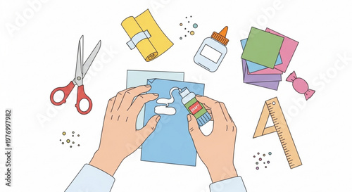 Hands crafting with scissors glue and paper a creative hobby concept for DIY projects and scrapbooking isolated on white