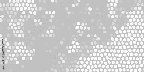 Abstract gray mosaic pattern with white cellular shapes, organic texture background for modern graphic design layout. A densely patterned abstract background featuring numerous irregular white shapes 