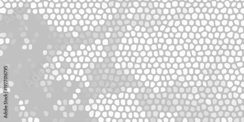 Abstract gray mosaic pattern with white cellular shapes, organic texture background for modern graphic design layout. A densely patterned abstract background featuring numerous irregular white shapes 