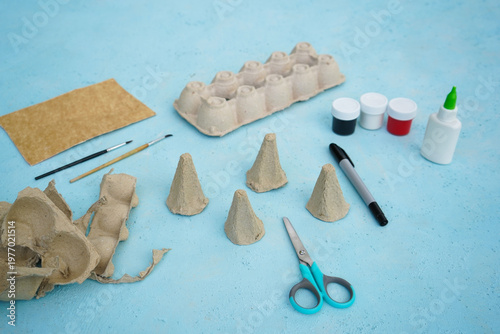 A simple DIY childrens craft is a family of mice made from cardboard egg packaging. Step 1 cut out the torso.