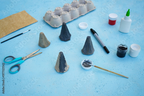 A simple DIY childrens craft is a family of mice made from cardboard egg packaging. Step 2 color it in gray