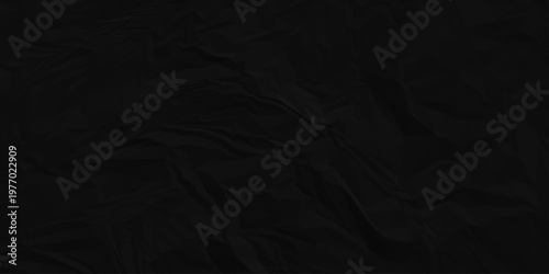 Crumple blank paper textured, business paper texture creased soft black background. Wave gray aged ripped wrinkle effect paper. Abstract grunge pattern rough page design.  