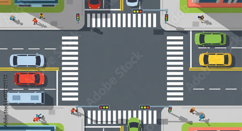 Aerial View of a Busy City Intersection with Cars and Pedestrians.