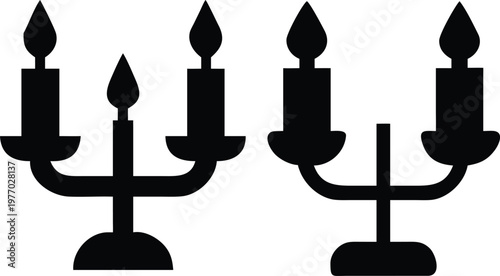 Pair of candelabra icon, silhouette vector design for decoration and celebration purposes.