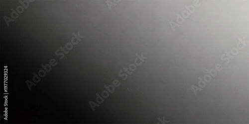 A dark brushed metal texture with a silver metallic pattern on a gray stainless steel plate surface for a modern industrial wallpaper backdrop