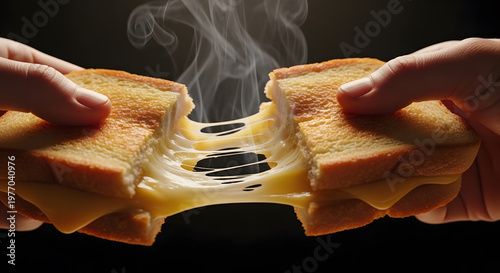 A melting grilled cheese sandwich is pulled apart by two hands.