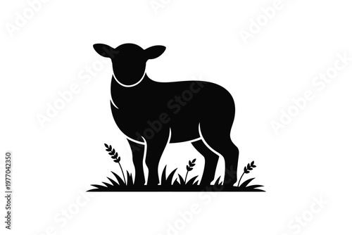 A black silhouette of a sheep standing in grassy field