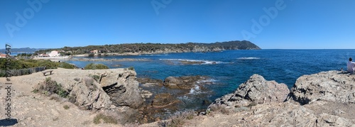 Panorama of rocky shoreline from Gaou island towards Sicié cape and little Gaou, Le Brusc, Six-Fours-les-Plages, France