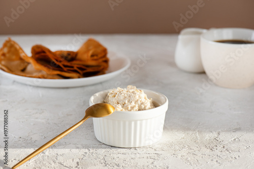 Vegan ricotta cashew cheese with gluten, dairy and sugar free crepes and cup of tea. Healthy Breakfast
