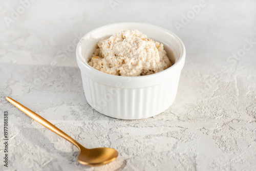 Vegan cashew ricotta in a bowl. Healthy plant based breakfast.