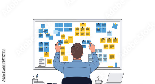 A focused male professional stands before a large white board meticulously organizing numerous blue and yellow adhesive notes during a complex project session.