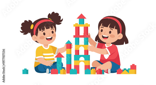 Two young girls with dark hair sit together constructing a tall central tower from vibrant red, yellow, and blue building blocks on a clean white surface.