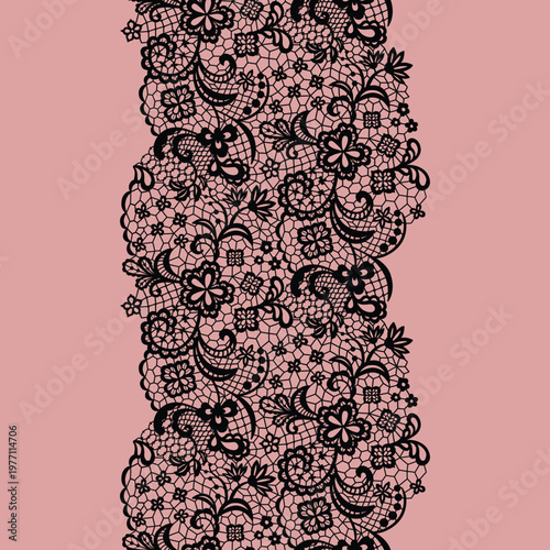 Elegant black lace floral seamless border with intricate mesh details. Vertical lace ribbon ornament on pink background, perfect for clothing trim, wedding invitations, luxury frames, and feminine gra