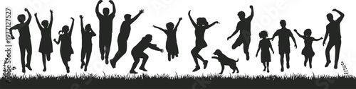 Black silhouettes of people jumping and playing in a field with a dog