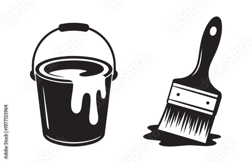 Paint bucket with dripping white paint and paintbrush standing in puddle art supply tools.