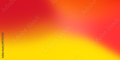 Soft focus red, orange, and yellow color gradient background. Warm vibrant abstract blend of hues