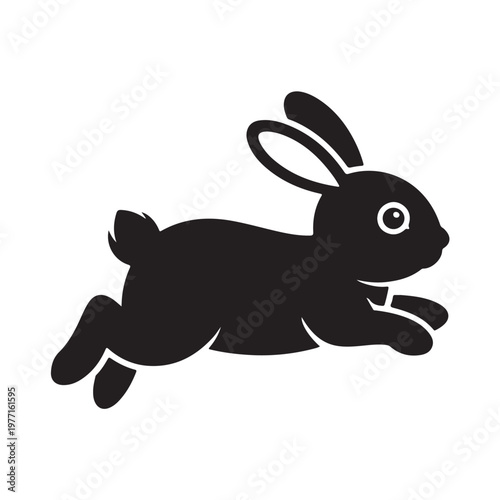 Black silhouette of a cute bunny hopping with ears perked up