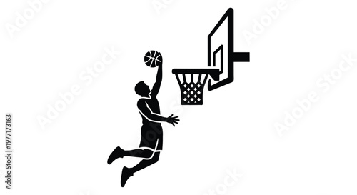 Silhouette of a basketball player in mid air preparing to dunk the ball