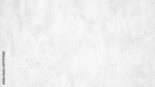 Gray and white textured surface with subtle speckles and faint marks neutral background