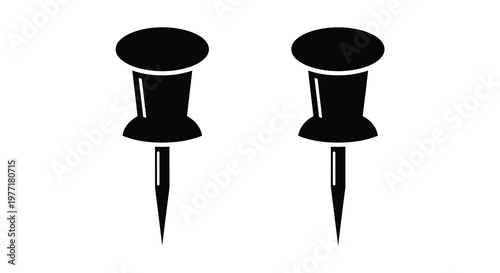 Two black push pins displayed against a white background