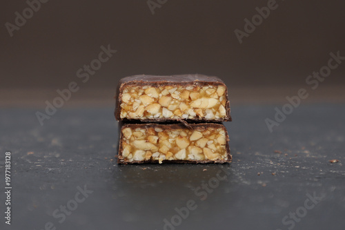 Chocolate candies with peanuts and caramel.