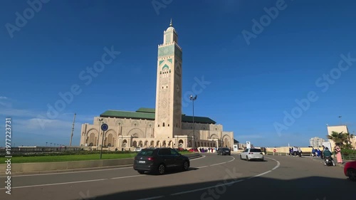 Casablanca, Morocco - 23 March 2026 , Hassan II Mosque street view with traffic, Hassan II Mosque Casablanca Morocco street view traffic road urban landmark
