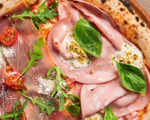 Fresh gourmet pizza topped with mortadella