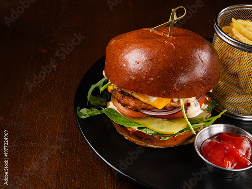 Juicy beef burger with cheese, tomato
