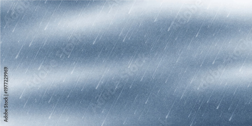 A dark storm sky creates a moody blue backdrop where rain and water drops on the window blend with mist and fog to form a natural textured pattern of wind and clouds