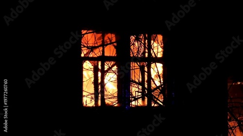 The house is on fire. A scary video of a burning dwelling.
