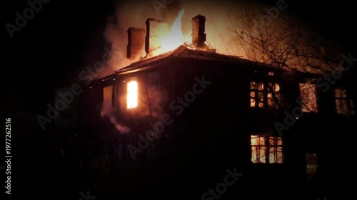 The house is on fire. A scary video of a burning dwelling.