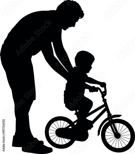 Touching fathers day silhouette dad teaching son to ride a bicycle