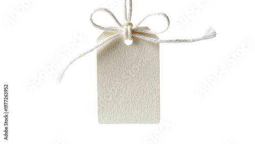 Foto Blank textured paper tag tied with white string bow, isolated on transparent bac