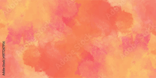 Abstract warm watercolor background with soft orange, yellow, and pink wash textures for artistic graphic design