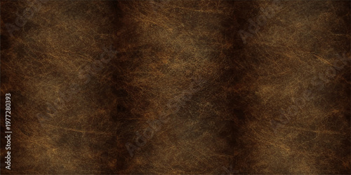 A dark aged vintage brown leather texture background with a rough grunge pattern and an antique parchment surface for a retro wallpaper design