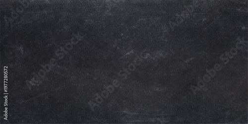 Black chalkboard texture background with dark grunge rough surface suitable for design backdrop