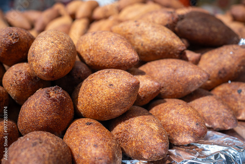 Pile of Traditional Turkish Icli Kofte (Stuffed Bulgur Meatballs) at Street Food Stall