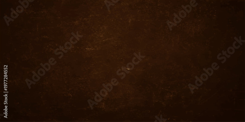 Dark antique parchment with a heavily textured brown grunge effect and aged vintage material creates a gritty blank backdrop